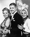 Image 3Alice Faye as Baroness Cecilia Duarte, Don Ameche as Larry Martin and Baron Manuel Duarte, and Carmen Miranda as Carmen in That Night in Rio, produced by Fox in 1941 (from 20th Century Studios)