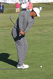 Woods practicing a chip-shot at the 2018 U.S. Open Tiger Woods 2018 US Open 26.jpg