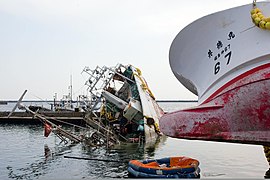 Zerstörungen im Hafen von Onahama (Foto: 29. März 2011)