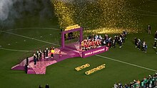 Spanish players celebrating on the presentation stage 2023FWWC Final (celebration).jpg