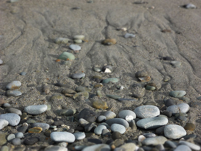 File:Beach stones and sand.JPG