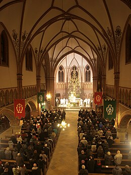 In many liturgical traditions of Christianity (such as Catholicism, Lutheranism and Anglicanism), catechumens are received into church membership during the Easter Vigil. Collegiate church of Gdansk-Wrzeszcz - Easter Vigil liturgy 2013.JPG