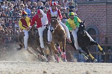 The horse race of the Palio di Legnano. In 2003 the medieval pageant of the Palio di Legnano was shown at the Columbus Day in New York City. Corsa ippica - Palio di Legnano 2014.JPG