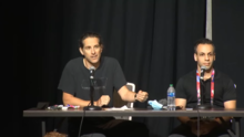 Right to repair activists speaking at a conference DEF CON 30 Right to Repair - Louis Rossmann and Joe Grand 24-2.png