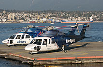 Два вертолёта Sikorsky S-76 авиакомпании Helijet в Ванкувер Харбор