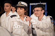 Israel Sea Corps officer wearing a combination cover for women Israel Navy First lieutenant Mor Ginat in end of course ceremony.jpg