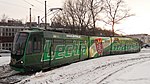 Geheel met reclame voor de plaatselijke voetbalclub beplakte N8C tram (ex. Dortmund).