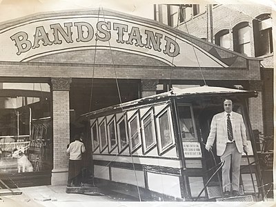 Sid Kastner standing on Sinai in front of "The Bandstand," where the two funicular cars were stored, 1969.