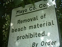 Sign in County Mayo, Ireland, forbidding the removal of sand and stones from a beach. Sign in mayo.jpg