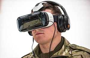 British Army Reserve soldier demonstrates a virtual reality headset Soldier Using Virtual Reality Headset MOD 45158483.jpg
