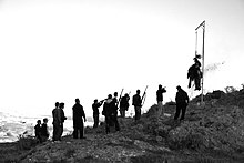 Shooting at the gallows of the effigy of Judas Iscariot, Santorini, Greece, April 2010 The Burning of Judas (4491213472).jpg