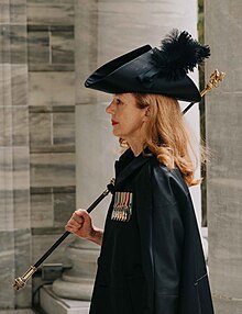 Usher of the Black Rod Sandra McKie at the State Opening of the New Zealand Parliament in 2023 Black-rod-2023.jpg