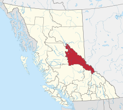 A map of British Columbia depicting its 29 regional districts and equivalent municipalities. One is highlighted in red.