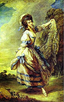 Old portrait of a standing woman richly dressed in an historical costume