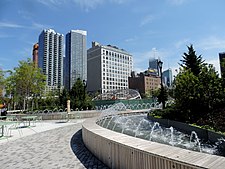 Hudson Pk fountain and 36 St bldgs jeh.JPG