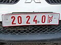 Behördenkennzeichen an einem Mitsubishi Pick-up
