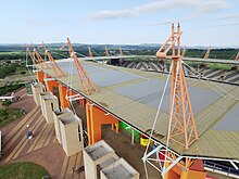 Aerial close up view of the roof support columns that resemble giraffe Mbombela Stadium roof view.jpg