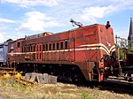 De altijd bruin gebleven loc 2275 ging in de jaren negentig naar België als NMBS 7608. Later kwam hij als museumloc terug in Nederland; 16 juli 2009.