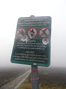Plinked sign in a Special Areas of Conservation in Ireland, indicating that ATVs are forbidden. No biking sign, Wicklow.jpg