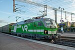 A Finnish Vectron Sr3 3301 at Kerava station in 2021. Note hump on the roof, lack of front air intakes and SA3 coupler