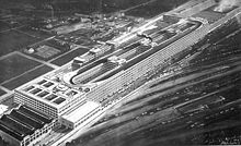 Lingotto factory in Turin. With its test track on the roof, it was recognized in 1934 as the first futurist invention in architecture Fiat Lingotto veduta-1928.jpg