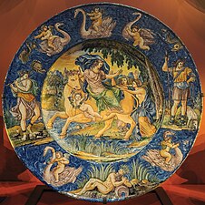 Nevers faience; central dish is 58 cm across, the main scene is the Rape of Europa, after an illustration of Ovid by François Chauveau, published in 1674