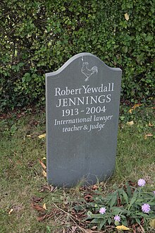 A gravestone depicting a figure as well as the inscription of Robert Yewdall Jennings.