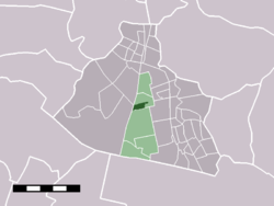 The town centre (dark green) and the statistical district (light green) of Westzaan in the municipality of Zaanstad.