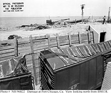 Boxcars within their revetments near the pier were crushed by the pressure of the blast PortChicagoBoxcarRevetment.jpg