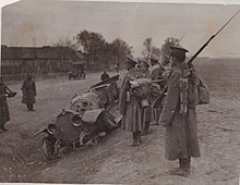 Imperial Russian Army soldiers inspect an auto wreckage, 1915 Russian Empire Soldiers 01.jpg