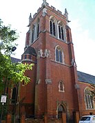 Iglesia de San Bernabé (1878), Ranskill, Nottinghamshire, en piedra con un campanario[PWi 18]​