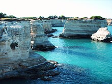 Horizontal layers of Cenozoic sedimentary rocks in the cliffs at Torre Sant'Andrea in Lecce province, southeast Italy Torre Sant'Andrea.jpg