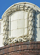 The top corner of the two street facades