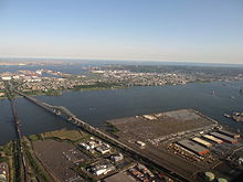 Upper Bay Bridge and Newark Bay Bridge. New Jersey Turnpike and Interstate 78. Oak Island Yard and Port Newark in foreground with Bayonne and Staten Island seen in the distance. Bayonne, New Jersey and Staten Island, New York.jpg