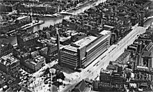 Aerial view of the Coolsingel with the famous Bijenkorf department store - architect Willem Dudok - partly destroyed during the bombing and demolished in 1960 Bijenkorf Rotterdam 1930.jpg