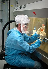 Scientist studying the H5N1 influenza virus Influenza virus research.jpg