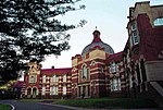 The foundation stone of the main building of this school was laid on 17 July 1908. The school was officially opened on 15 April 1909 by General J. C. Smuts, then Colonial Secretary of the Transvaal. These buildings are good examples of Edwardian architecture. Type of site: School