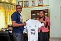 Presenting the 1lib1ref t-shirts to the University librarian of Nimbe Adeipe library, FUNAAB