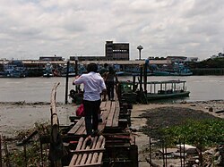 Mae Klong ferry pier beside Wat Ban Laem. The Mae Klong bisects Samut Songkhram.