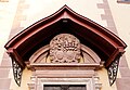 Wappen über dem Eingang der Kirche St. Marien