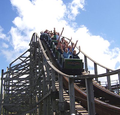  a coaster with the words Oakwood then Theme Park in a box underneath.