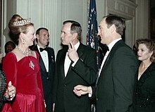 Ryan is introduced to Margrethe II of Denmark by George H. W. Bush in 1991. His wife, Ruth, is at right. President George H. W. Bush introduces Nolan Ryan to Queen Margrethe II of Denmark at a State Dinner (cropped).jpg