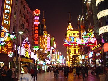 Neon lights in modern Shanghai show a predominance of red and yellow