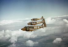 Three Oxford Mk Is of No. 6 Flying Training School at RAF Little Rissington, Gloucestershire, in formation flight The Royal Air Force in Britain, February 1942 TR33.jpg