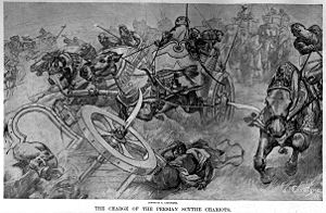 300px-The_charge_of_the_Persian_scythed_chariots_at_the_battle_of_Gaugamela_by_Andre_Castaigne_%281898-1899%29.jpg