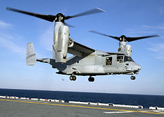 The Bell Boeing V-22 Osprey US Navy 061206-N-0458E-076 A U.S. Marine Corps V-22 Osprey helicopter practices touch and go landings on the flight deck of the multipurpose amphibious assault ship USS Wasp (LHD 1).jpg