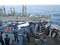 USS Tortuga pulls alongside JS Hamana for refueling on 2 November 2011.