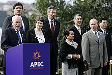 Prime Minister John Howard with APEC leaders in Sydney in 2007. Howard supported the traditional icons of Australian identity and its international allegiances, but oversaw booming trade with Asia and increased multiethnic immigration. Vladimir Putin at APEC Summit in Australia 7-9 September 2007-18.jpg