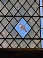 Depiction of a white-crowned sparrow in window in St Margaret's
