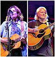 Picture from the waist-up of two White women playing guitar